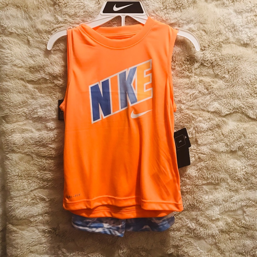 NWT 2 piece (shirt & shorts) muscle set